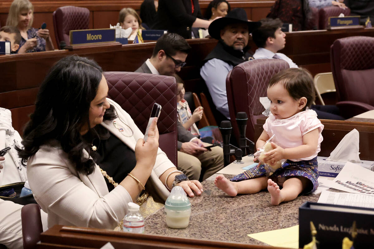 Assemblymember Cecelia González, D-Las Vegas, plays with her daughter Itsara González, 11, mo ...