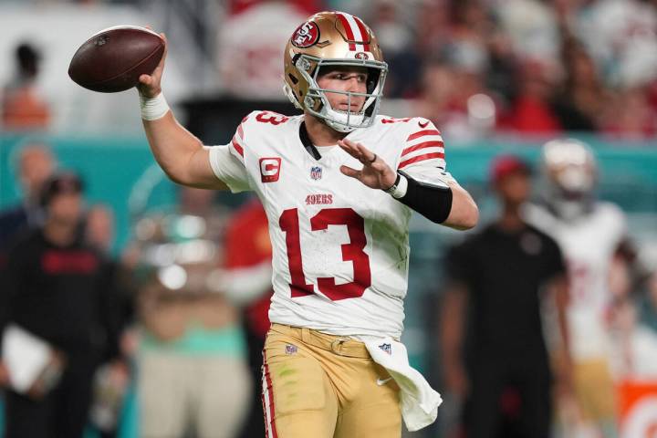 San Francisco 49ers quarterback Brock Purdy (13) aims a pass during the second half of an NFL f ...