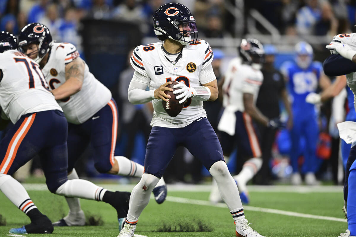 Chicago Bears quarterback Caleb Williams looks to pass during the second half of an NFL footbal ...