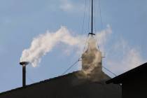 White smoke billows from the chimney of the Sistine Chapel where 133 cardinals are gathering on ...