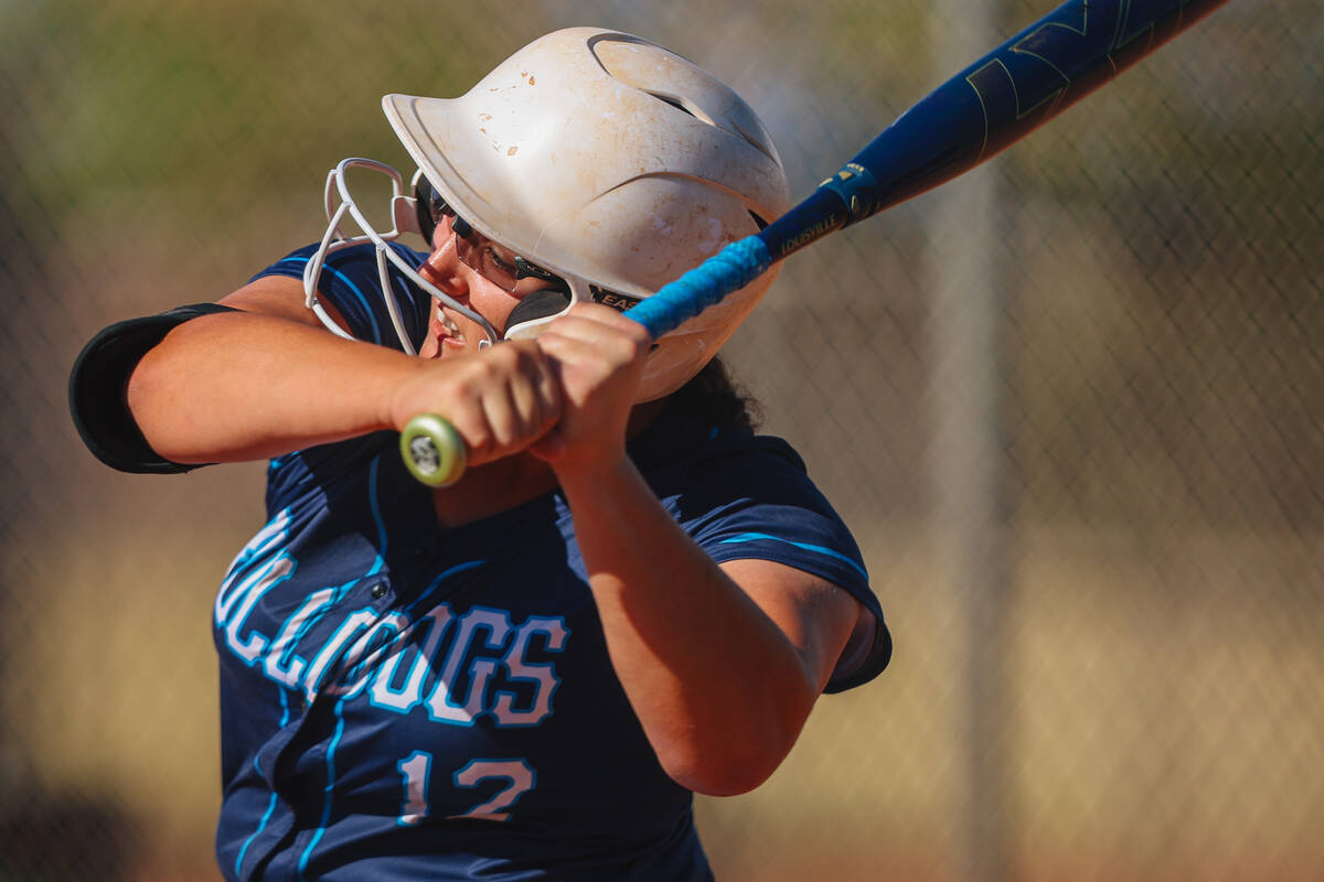 Centennial’s Campbell Cole swings the bat during a high school Class 5A Softball Souther ...