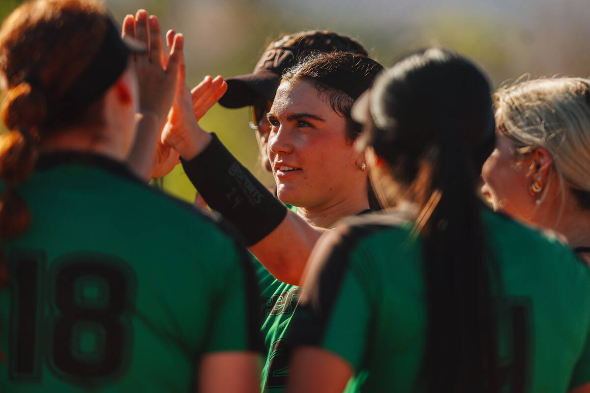Palo Verde pitcher Ava Koenig high fives her teammates during a high school Class 5A Softball S ...