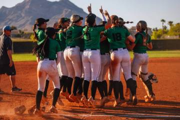 Palo Verde teammates celebrate winning a high school Class 5A Softball Southern Region winners ...