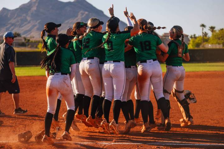 Palo Verde teammates celebrate winning a high school Class 5A Softball Southern Region winners ...