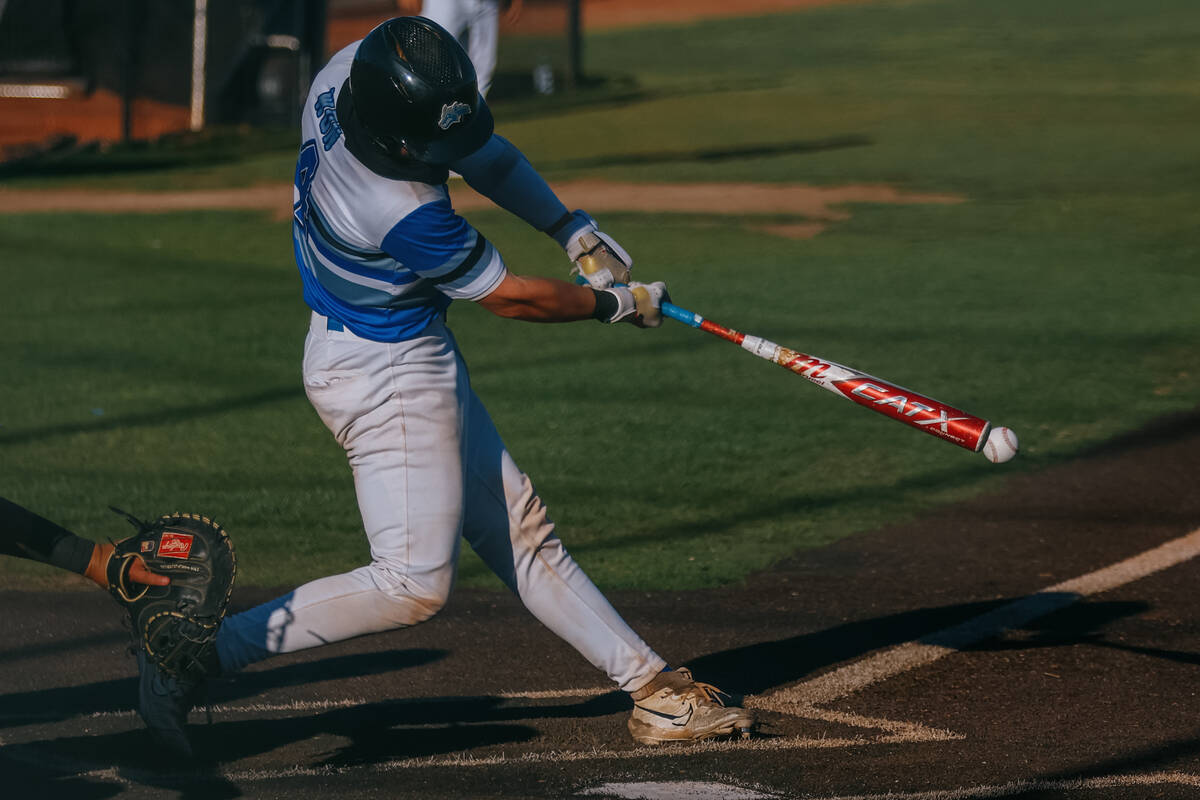 Basic’s Koa Won (4) hits a ground ball that resulted in a scored run during the the NIAA ...