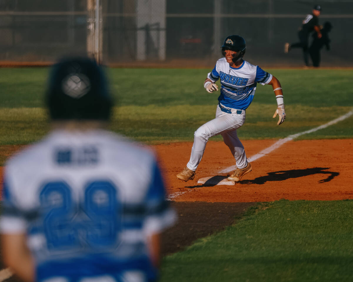 Basic’s Dallon Cegavske (24) rounds third base on his way home during the NIAA 5A Southe ...