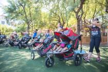 Moms participate in a Stroller Strides class put on by Fit 4 Mom at Town Square in Las Vegas on ...