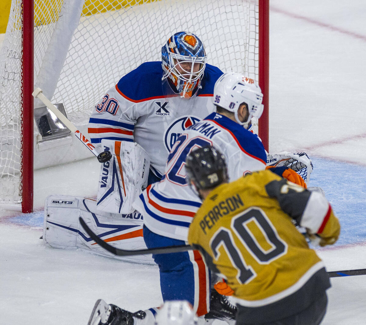 The puck strikes the pad of Edmonton Oilers goaltender Calvin Pickard (30) as Golden Knights le ...
