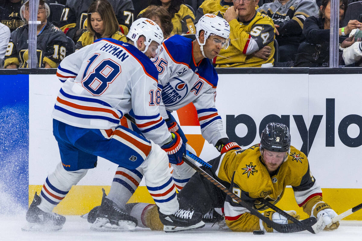 Golden Knights center Jack Eichel (9) goes to the ice to chase a puck against Edmonton Oilers d ...