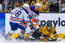 Golden Knights center Jack Eichel (9) goes to the ice to chase a puck against Edmonton Oilers d ...