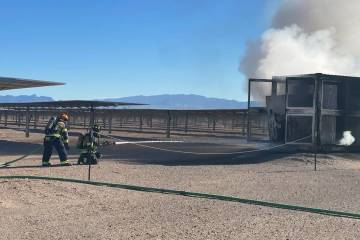 Firefighters respond to a fire at a solar facility near Boulder City on May 8, 2025. (Boulder C ...