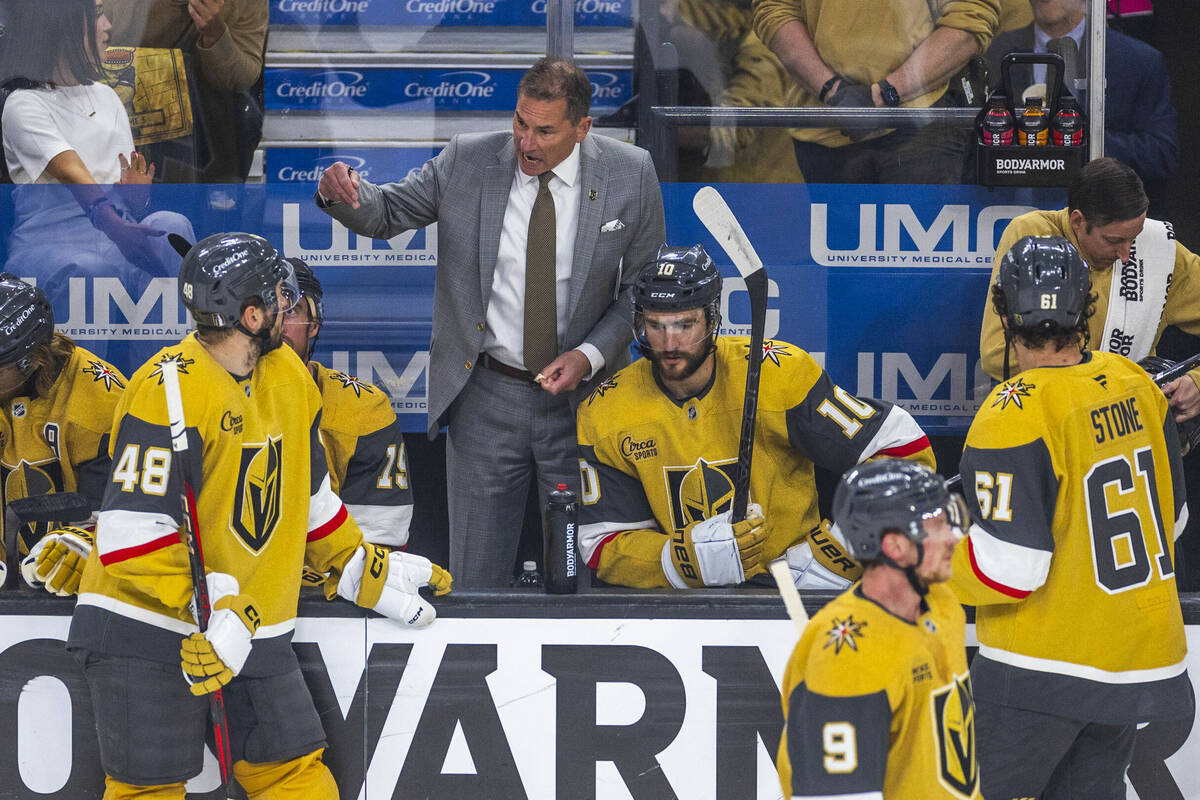 Golden Knights head coach Bruce Cassidy speaks with his players on a time out against the Edmon ...