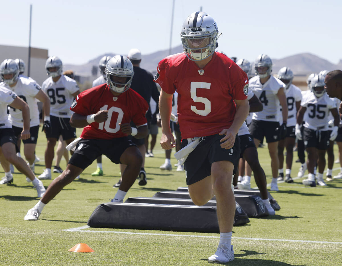 Raider quarterback Cam Miller goes through a drill during the 2025 rookie mini camp at the Inte ...