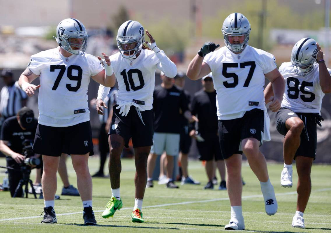 Raiders defensive line Laki Tasi (79) wide receiver Donte Thornton Jr. (10) and linebacker Jail ...