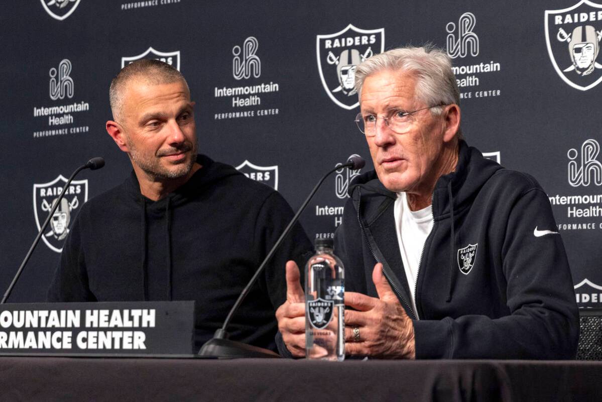 Raiders general manager John Spytek, left, and head coach Pete Carroll answer questions during ...