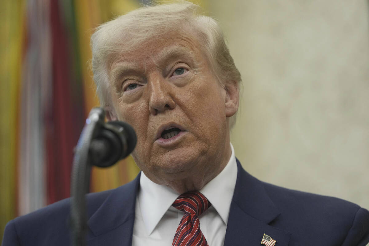 President Donald Trump speaks before David Perdue is sworn in as U.S. Ambassador to China durin ...