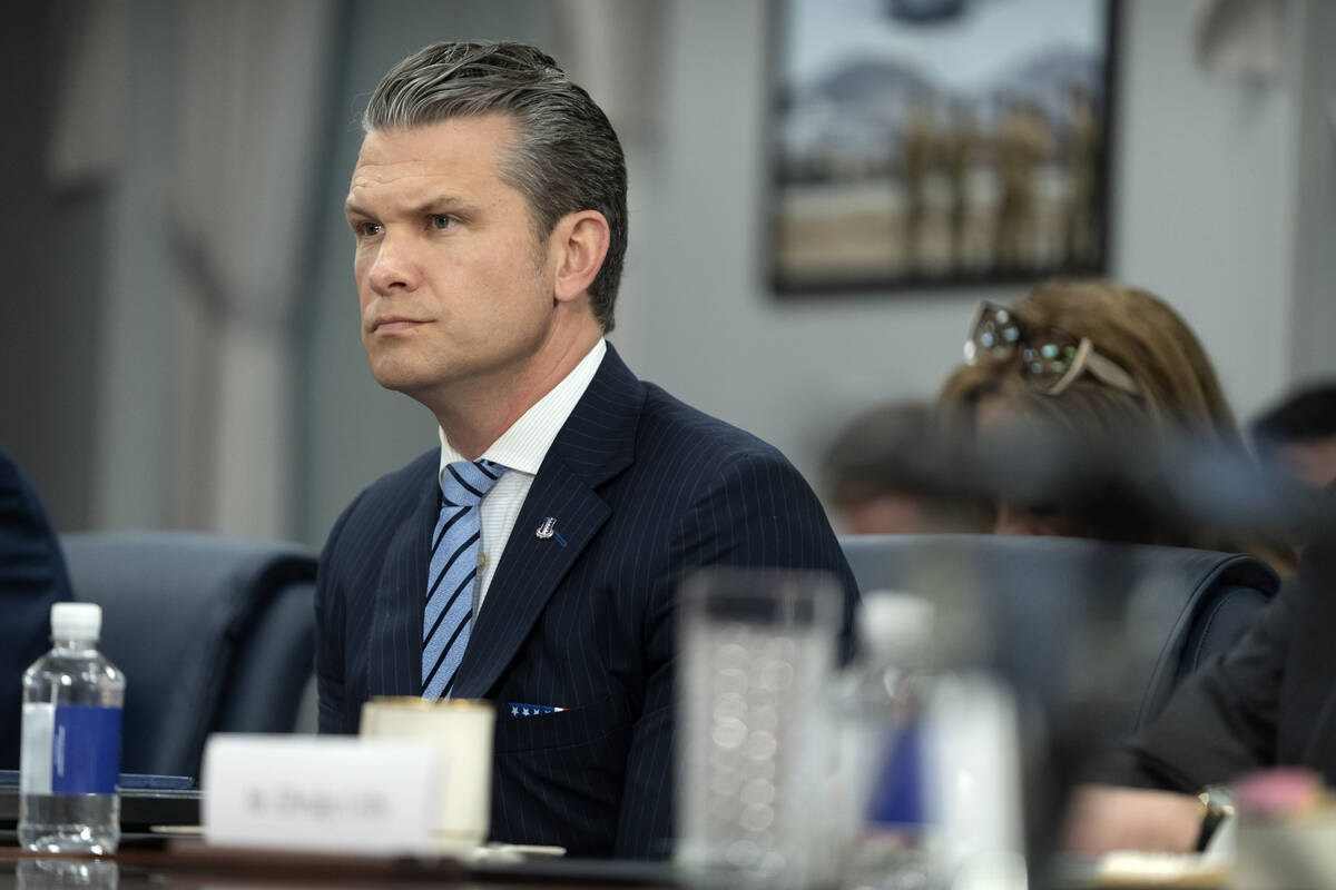 Secretary of Defense Pete Hegseth listens during a meeting with Peru's Foreign Affairs Minister ...