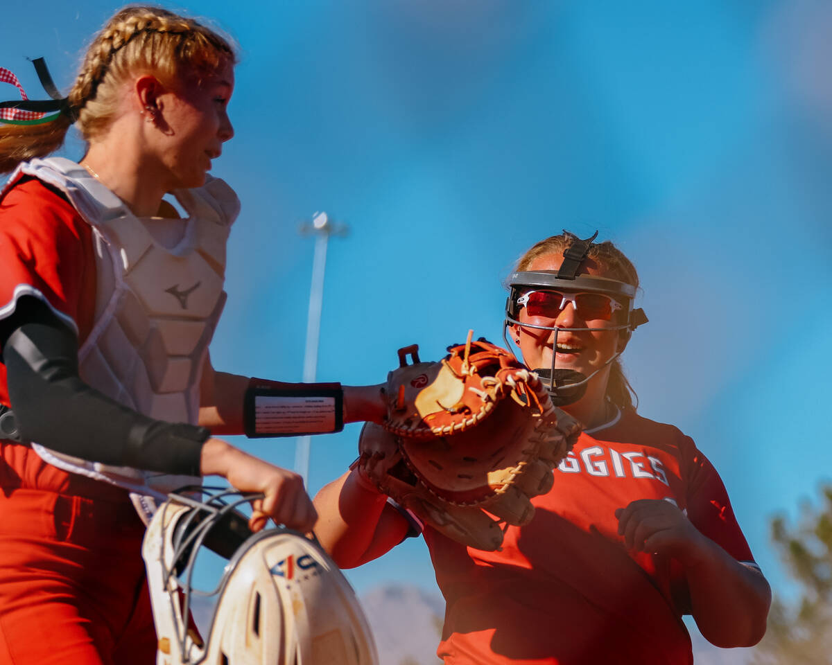 Arbor View pitcher Audrey Melton (22) and catcher Kelsie Phares (39) fist bump after Melton end ...