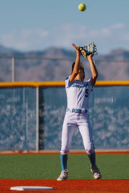 Centennial infielder Valeria Lopez (5) catches a pop fly during the NIAA 5A Southern Region sem ...