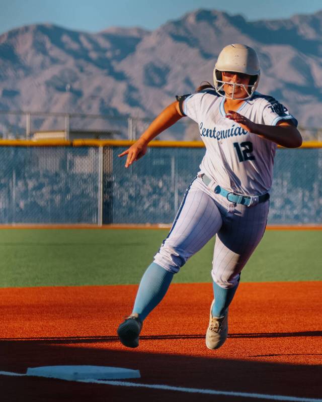 Centennial’s Campbell Cole (12) rounds third on her way home during the NIAA 5A Southern ...