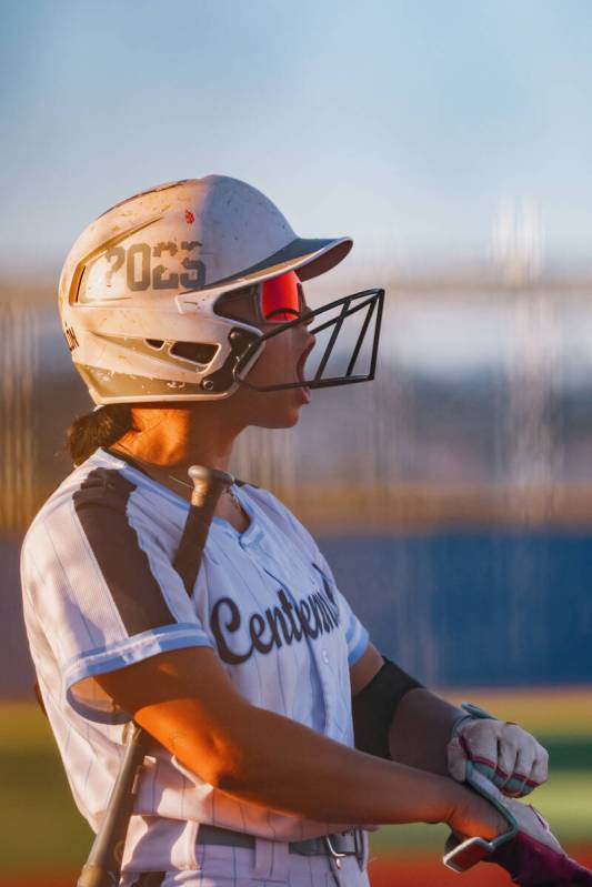 Centennial’s Amanda Campos-Colon (13) cheers on the current hitter while waiting on deck ...