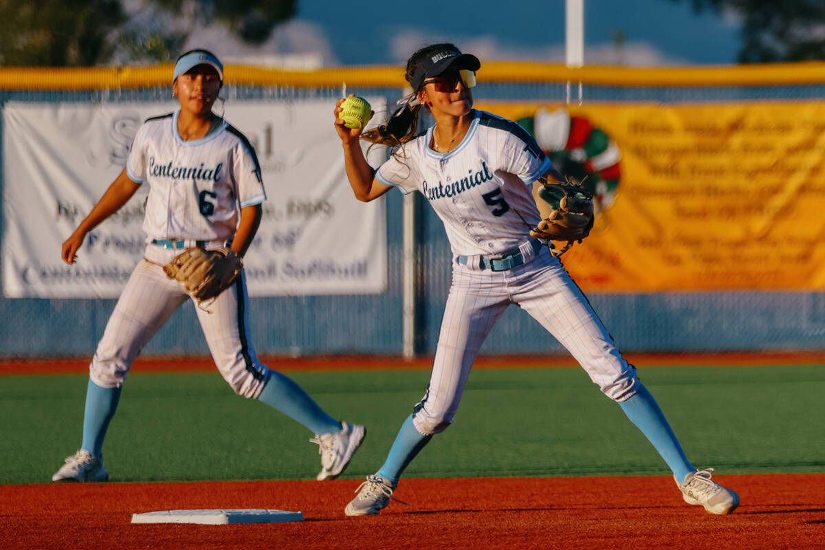 Centennial’s Valeria Lopez (5) turns to throw to first base during the NIAA 5A Southern ...