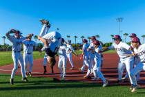 Faith Lutheran's Corbin Sterner (30) does a backflip as players celebrate their win over Palo V ...