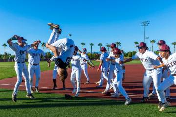 Faith Lutheran's Corbin Sterner (30) does a backflip as players celebrate their win over Palo V ...