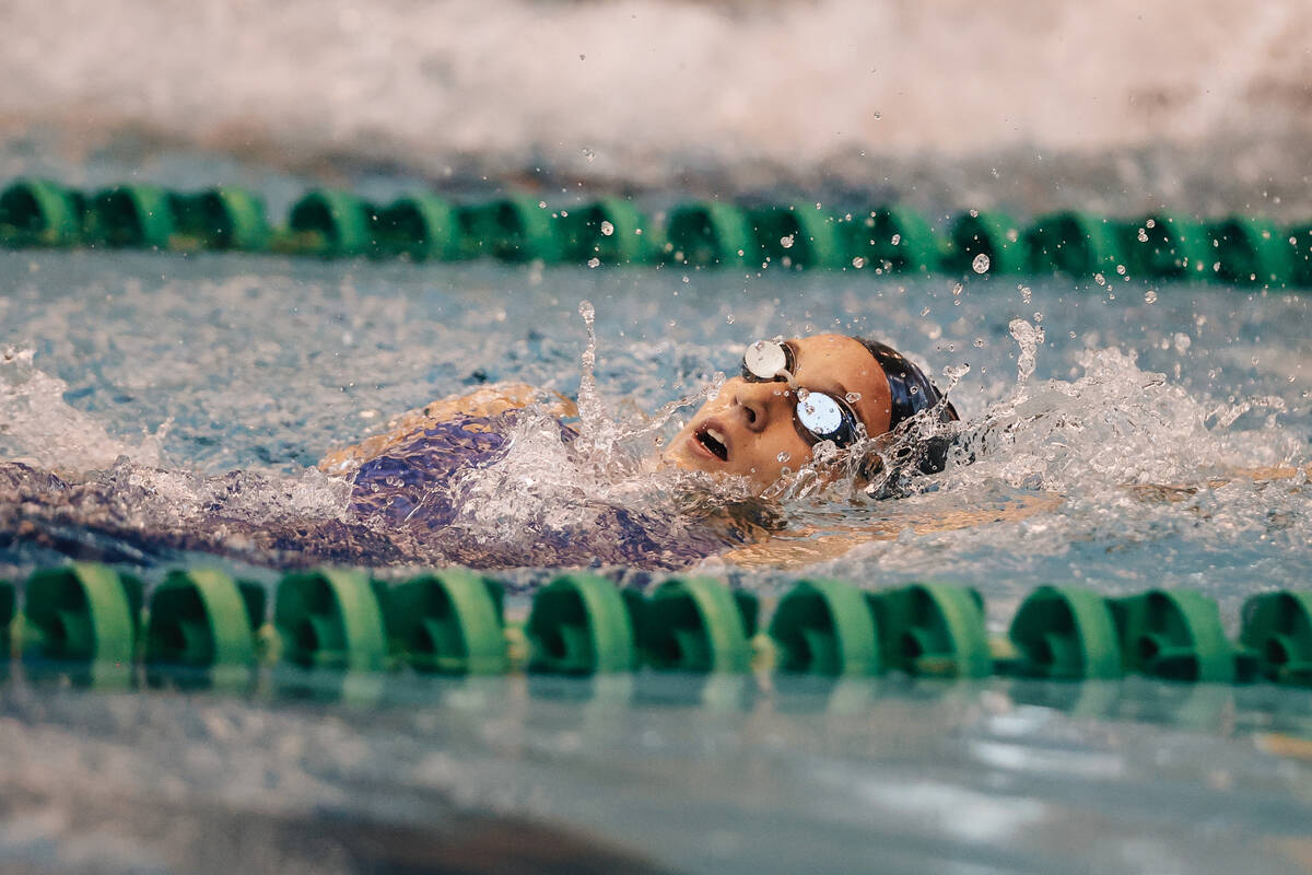 Coronado swimmer Addison Holmes competes in the 200-yard individual medley during the Class 5A ...