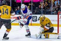 Edmonton Oilers center Mattias Janmark (13) attempts to deflect a puck into the net which is sa ...