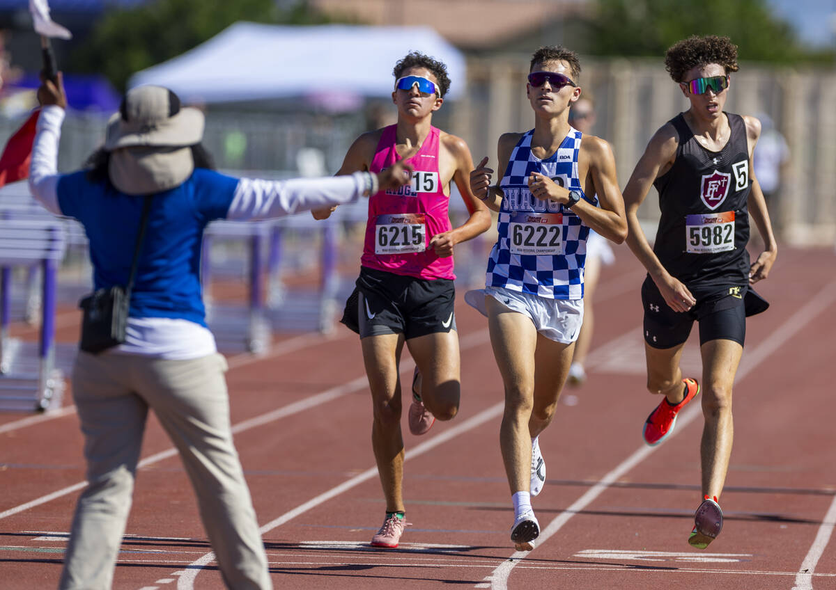 Shadow Ridge's Justin Rawe (6222) wins beside Shadow Ridge's Landon Larsen (6215) and Faith Lut ...