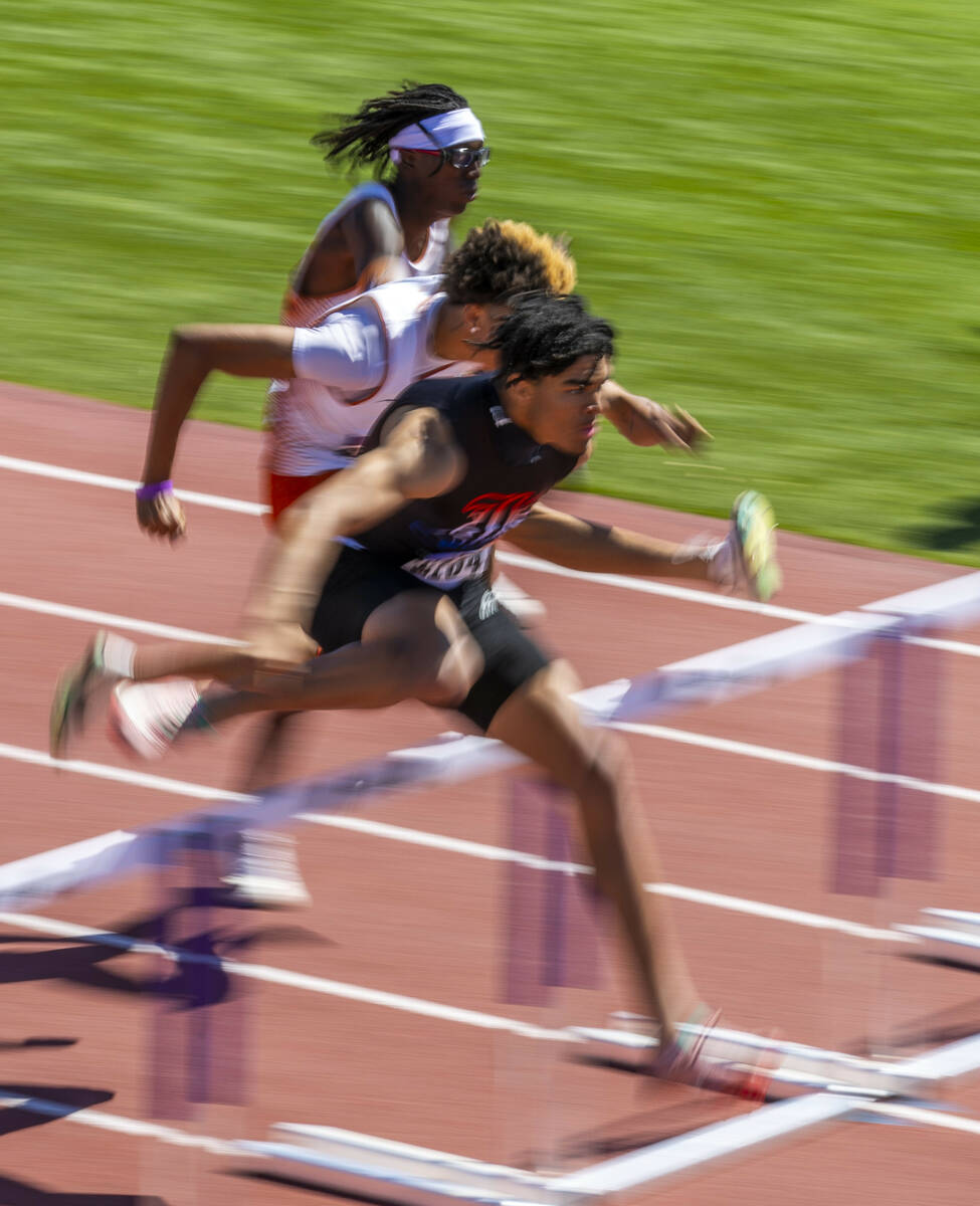 Liberty's Sean Craig (6104) leads the boys 110 meter hurdles during the Class 5A Southern Regio ...