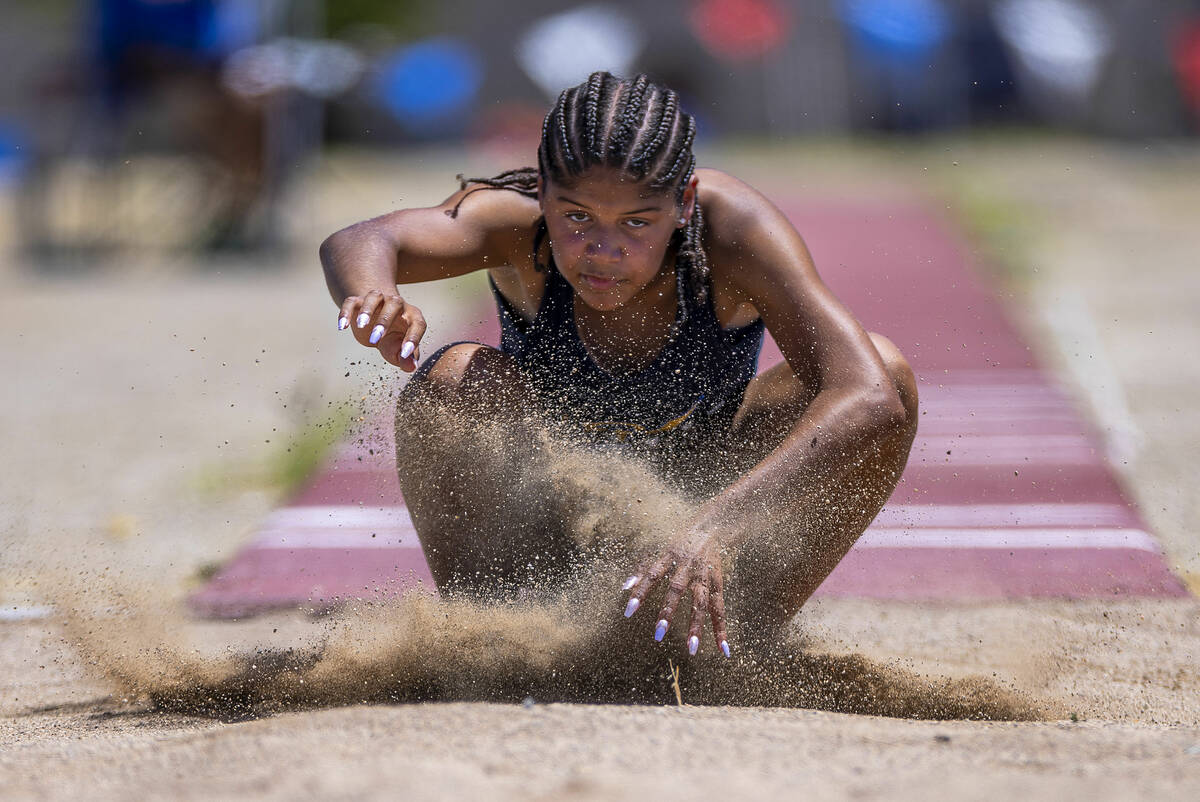 Sierra Vista's Mya Wiley hits the sand in the 4A girls triple jump during the Class 4A/5A South ...