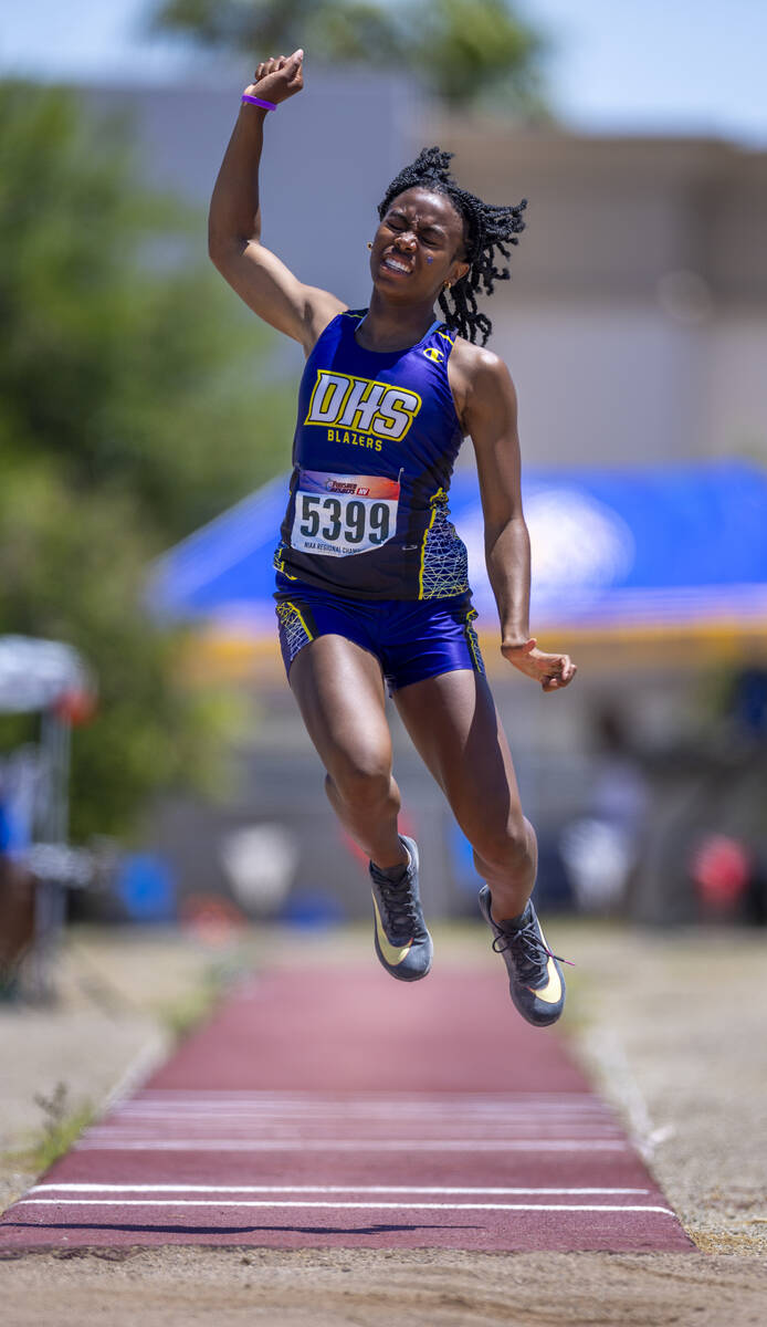 Durango's Amarie Riley (5399) leaps to a state qualifier in the 4A girls triple jump during the ...