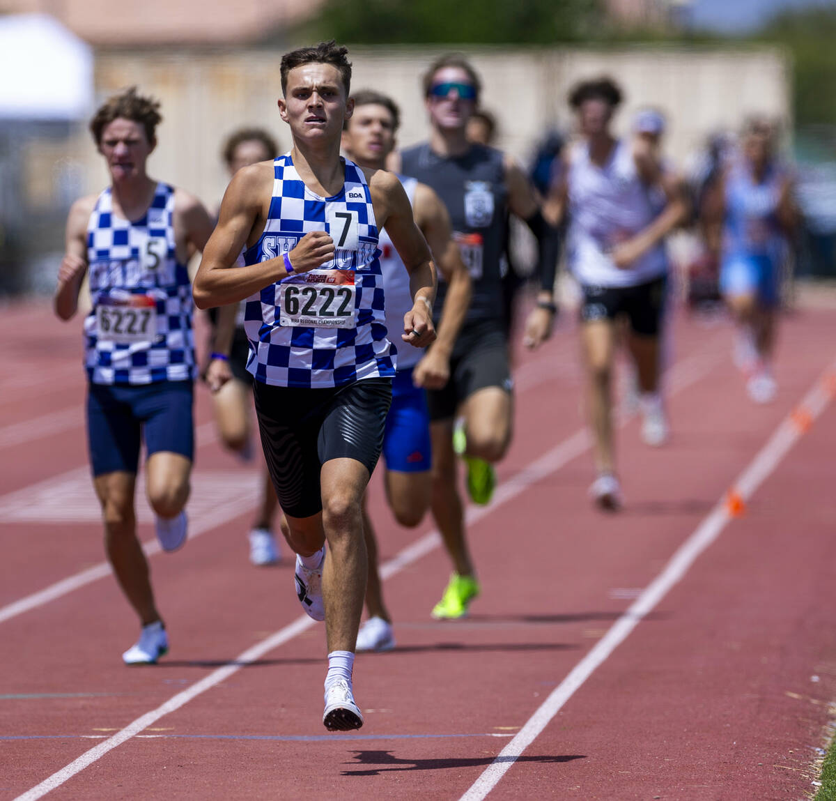 Shadow Ridge's Justin Rawe (6222) leads the boys 800 meter run in the Class 5A Southern Region ...