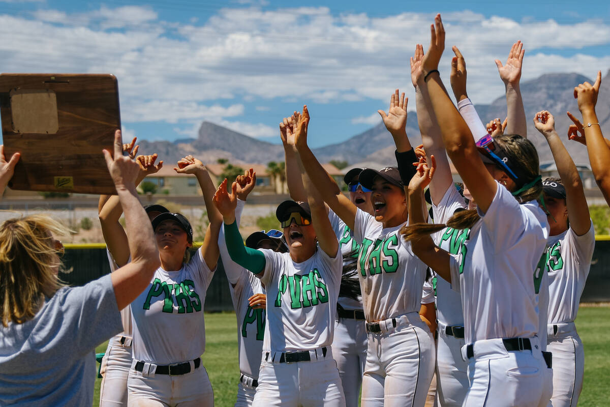The Palo Verde softball team cheers while receiving the award plaque for winning the NIAA 5A So ...
