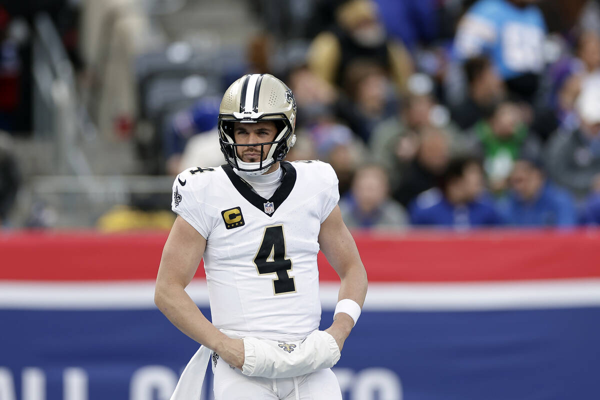 New Orleans Saints quarterback Derek Carr (4) reacts during an NFL football game against the Ne ...