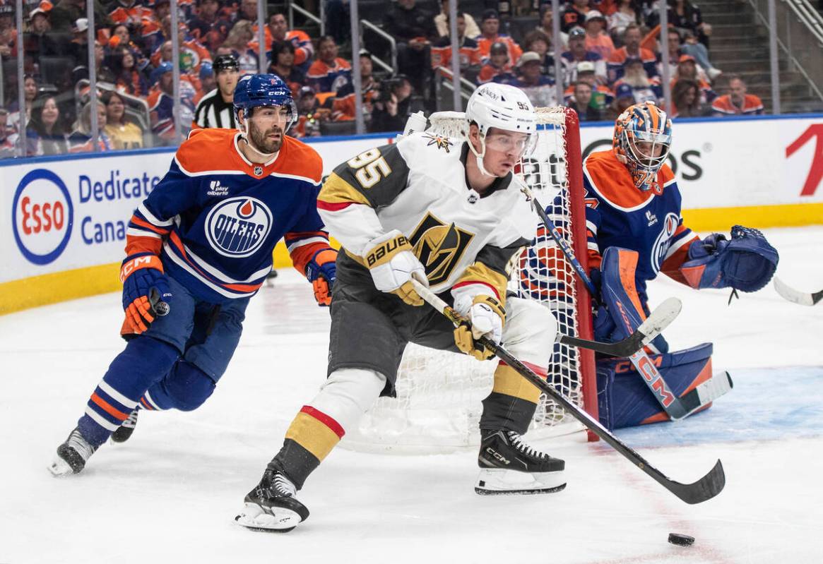 Vegas Golden Knights' Victor Olofsson (95) is chased by Edmonton Oilers' Evan Bouchard (2) as g ...