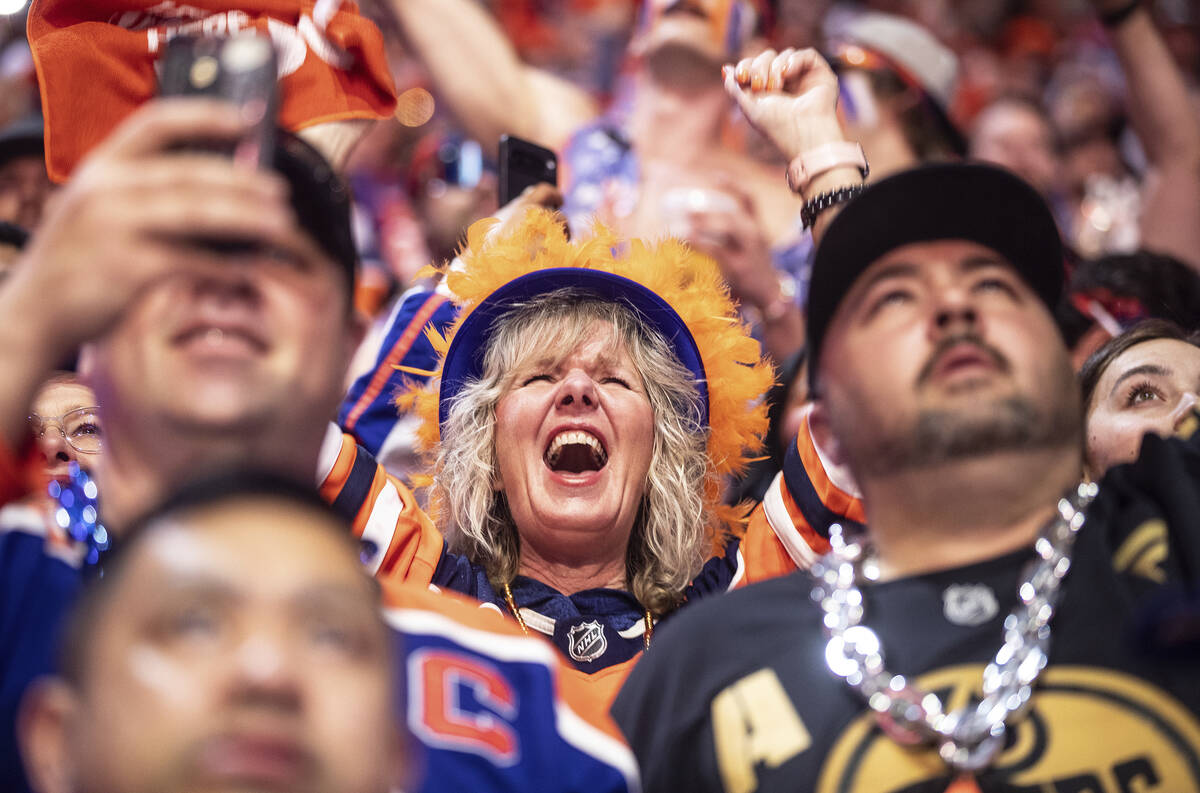 Fans cheer as the Vegas Golden Knights and the Edmonton Oilers take to the ice before Game 3 of ...