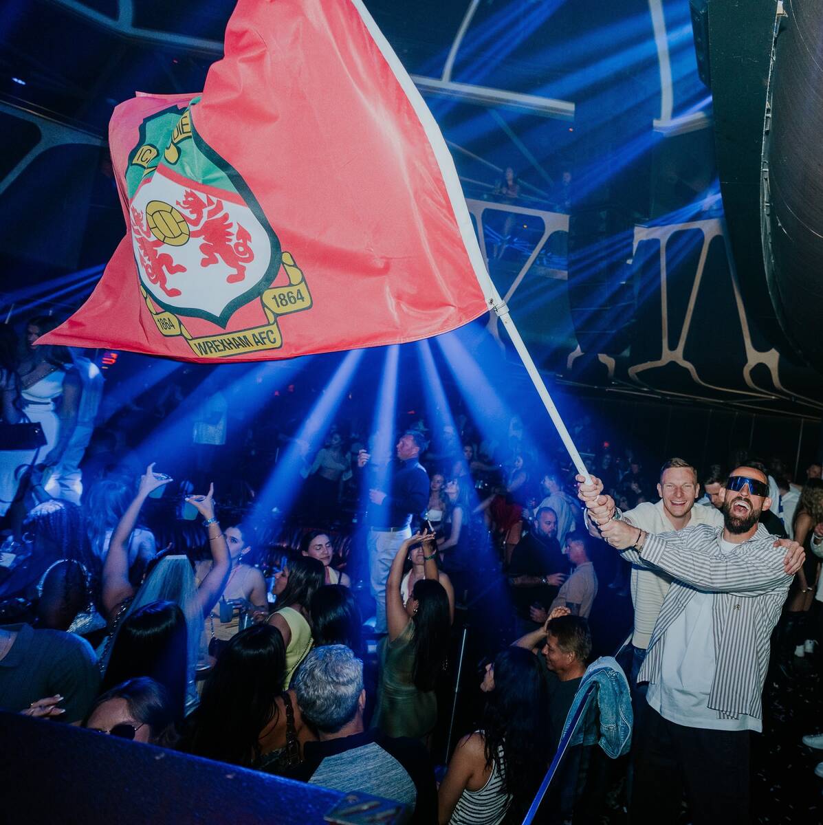 Members of Wrexham A.F.C. celebrate the team's promotion to the English Football League Champio ...