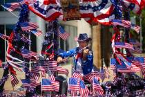 A fiddler performs on the Americana Man float during the annual Helldorado Days Parade on Satur ...