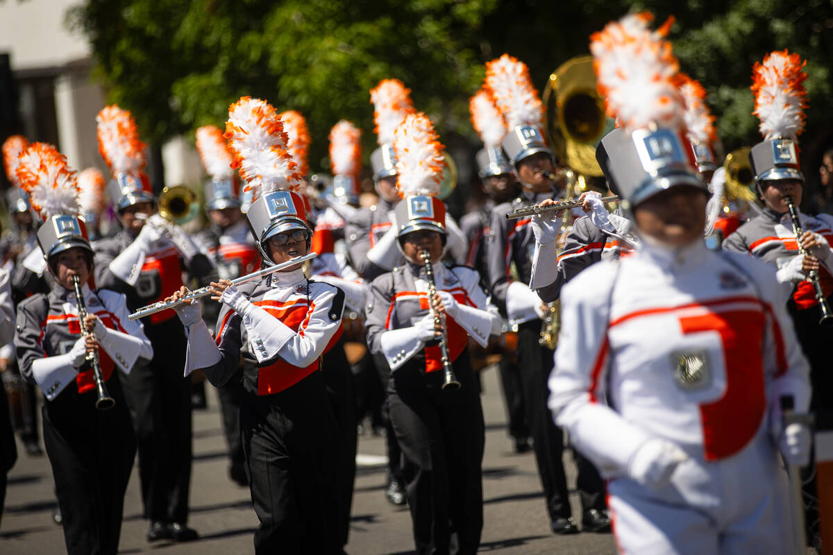 Members of the Chaparral High School marching band perform during the annual Helldorado Days Pa ...