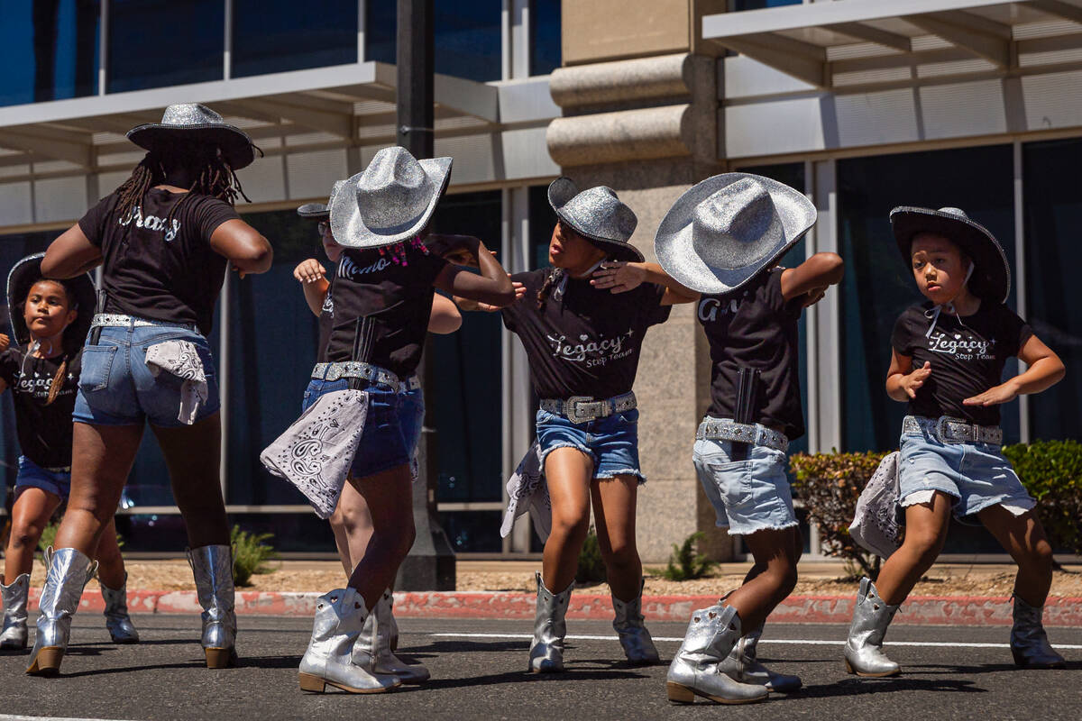 Members of the Legacy Step Team perform during the annual Helldorado Days Parade on Saturday, M ...