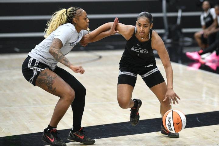 Tiffany Mitchell guards Deja Kelly during the Las Vegas Aces first day of training camp Sunday, ...