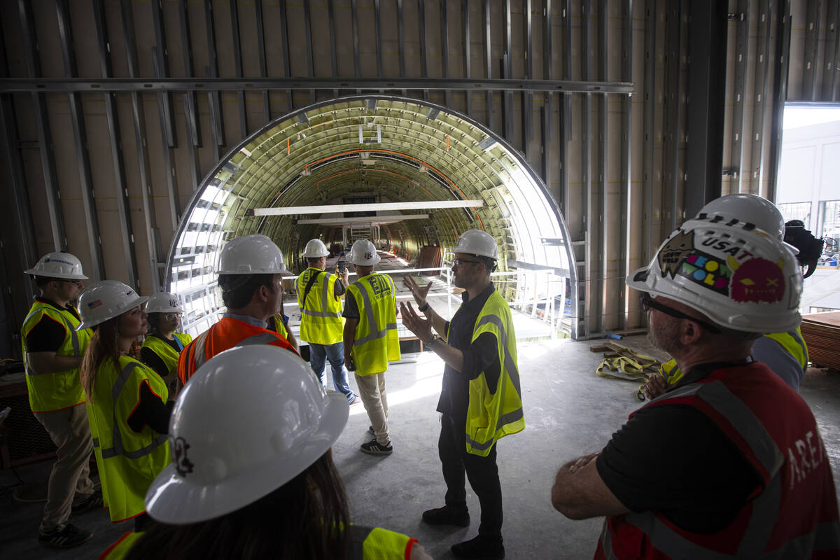 Winston FIsher, CEO of Area15, center right, speaks during a tour of the 20-acre expansion plan ...