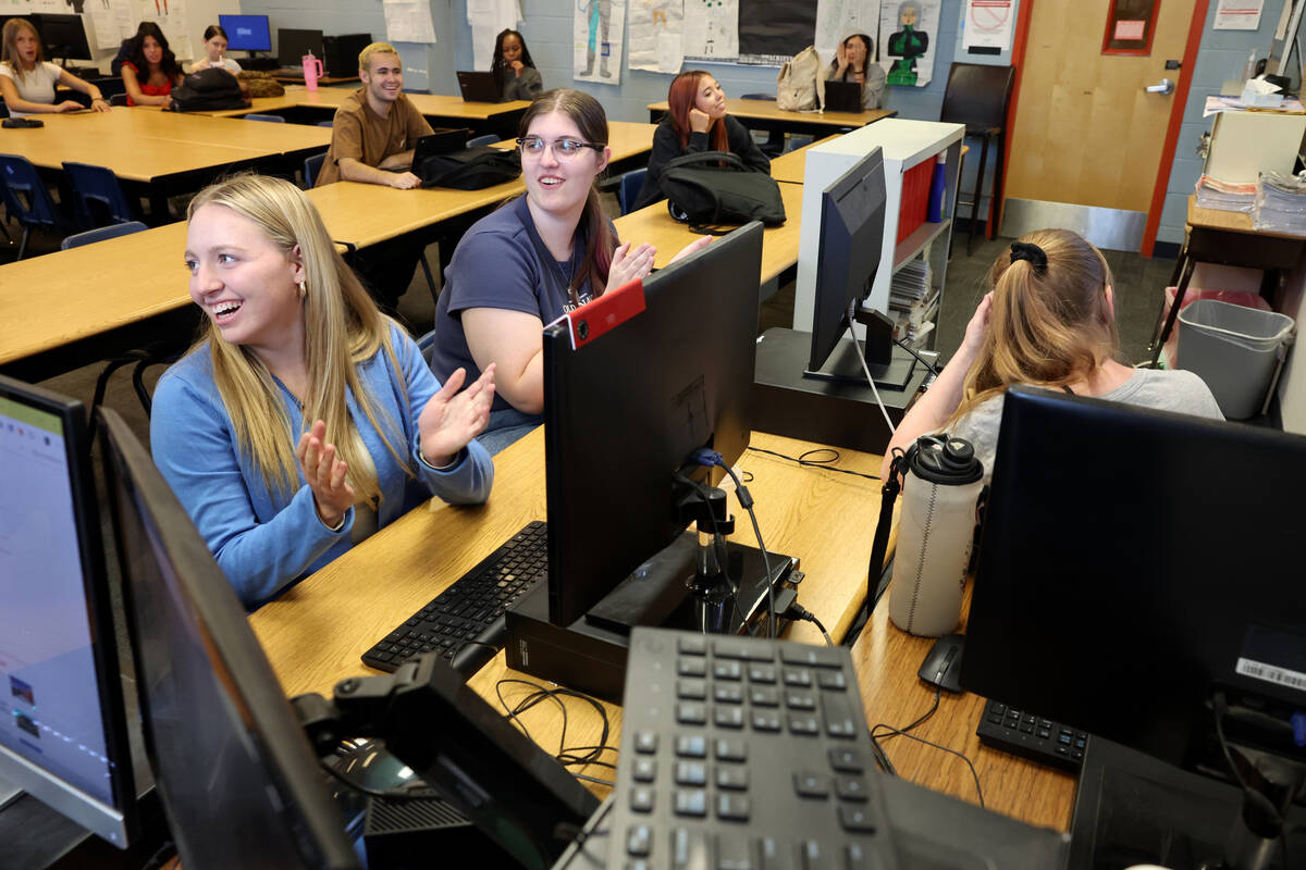 Hillside Hotwire staff members, including Editor-in-Chief Paige Ackerman, left, and webmaster A ...