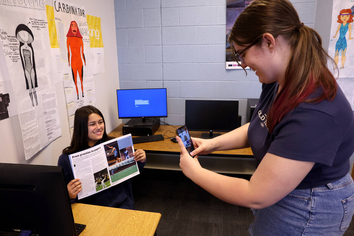 Hillside Hotwire webmaster Abigail “AJ” Fisher takes a photo of Alexandra Crunk w ...
