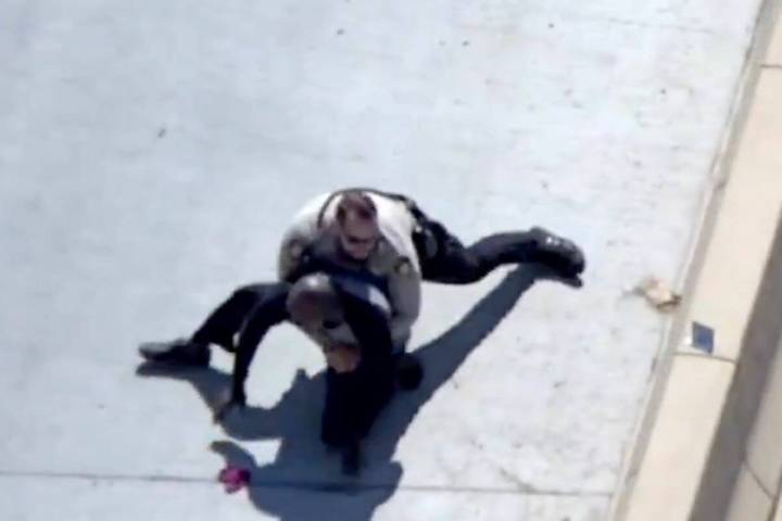 Metropolitan Police Department officers locate a man with help from the AIR2 police helicopter, ...