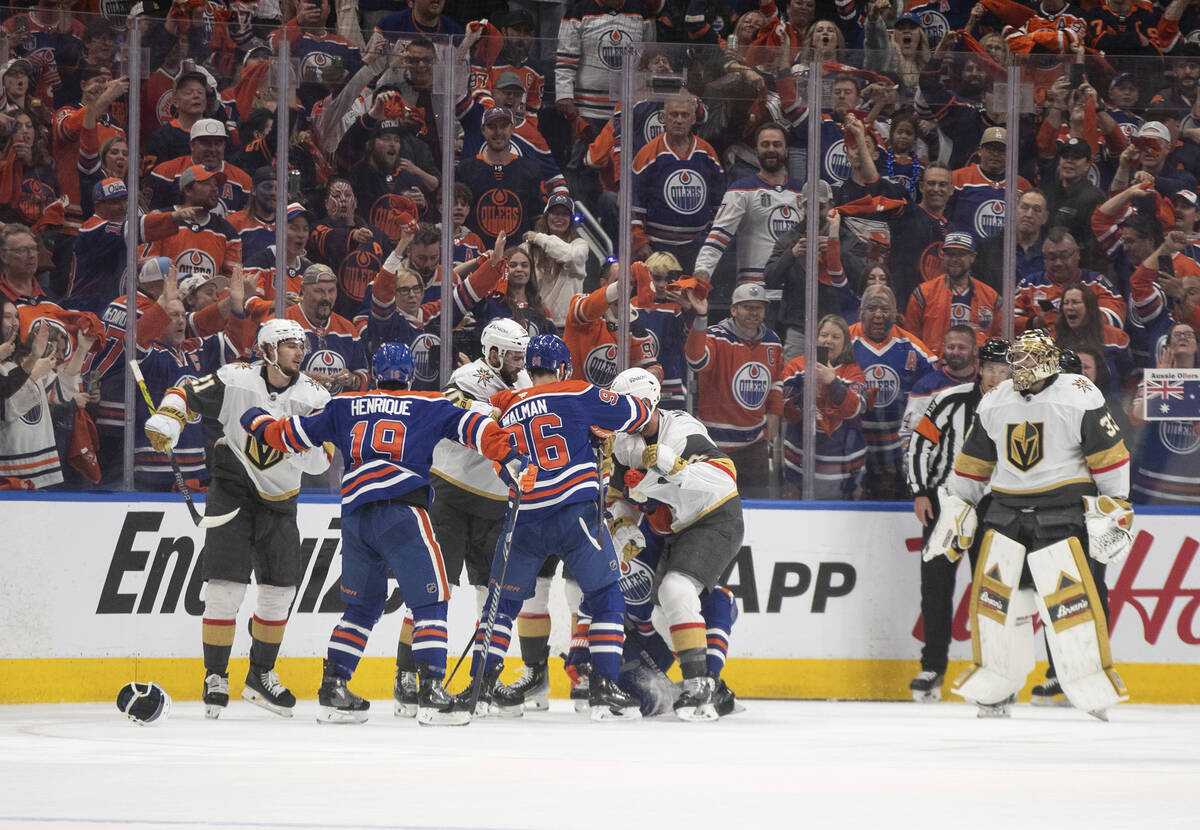 Vegas Golden Knights and Edmonton Oilers rough it up during the first period of Game 4 of a sec ...