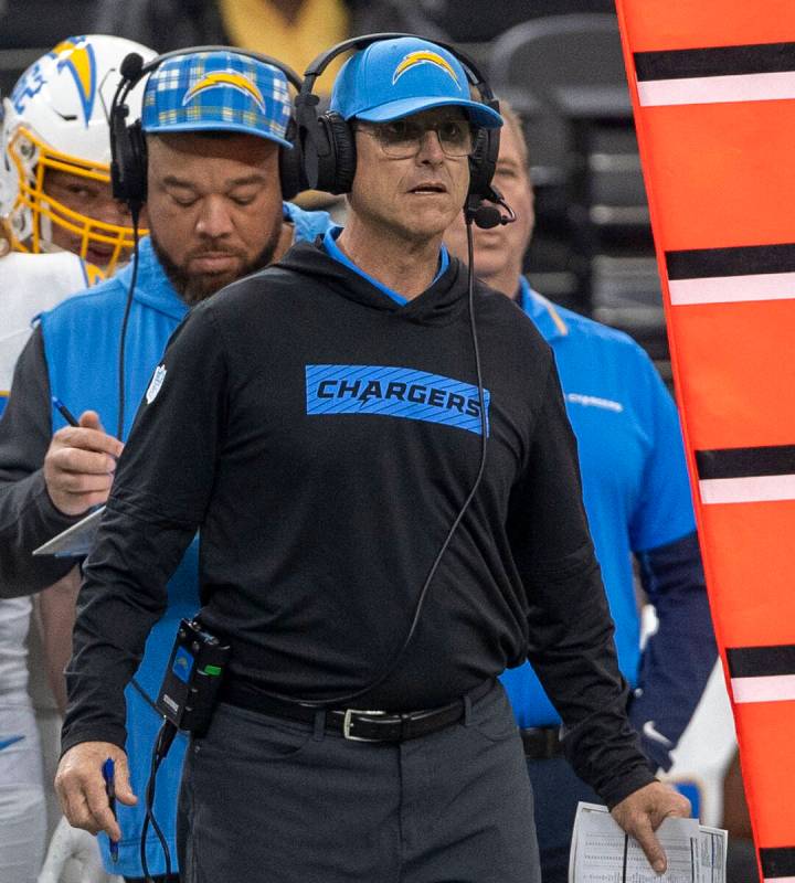 Los Angeles Chargers head coach Jim Harbaugh looks on from the sideline during the first half o ...